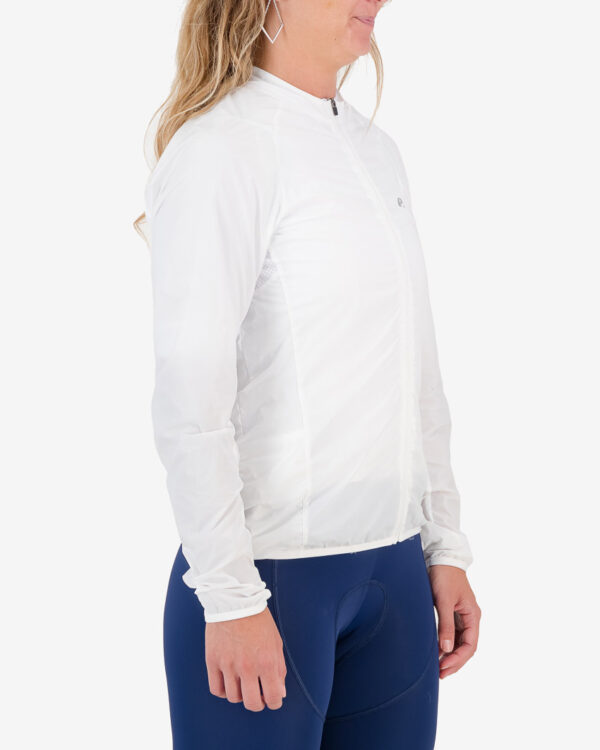 Three quarter view of the ladies Enjoy Atom Jacket in the white colour way with reflective detailing made by Enjoy.cc
