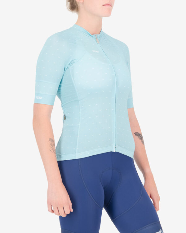 Three quarter of the ladies cycling shirt in the Cool Breeze Light Blue Octane design made by enjoy.cc