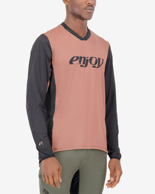 Three quarter view of the Enjoy mens long sleeve enduro cycling jersey in the tan Descendant design. Part of Reptilia trail range designed by enjoy.cc