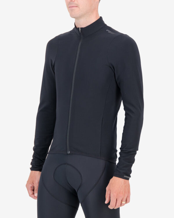 The three quarter view of the mens fleeced cycling jersey in matte black with reflective detailing is part of Enjoy's winter cycling clothing range available at enjoy.cc
