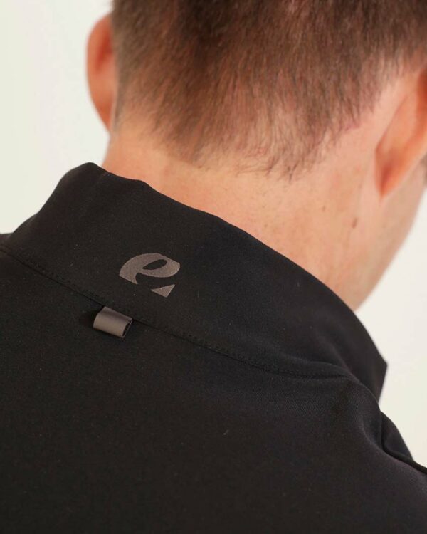 Close up reflective neck detailing of the Race Cocoon. A mens fleeced cycling jersey developed by Enjoy. Cycling Apparel solutions at enjoy.cc