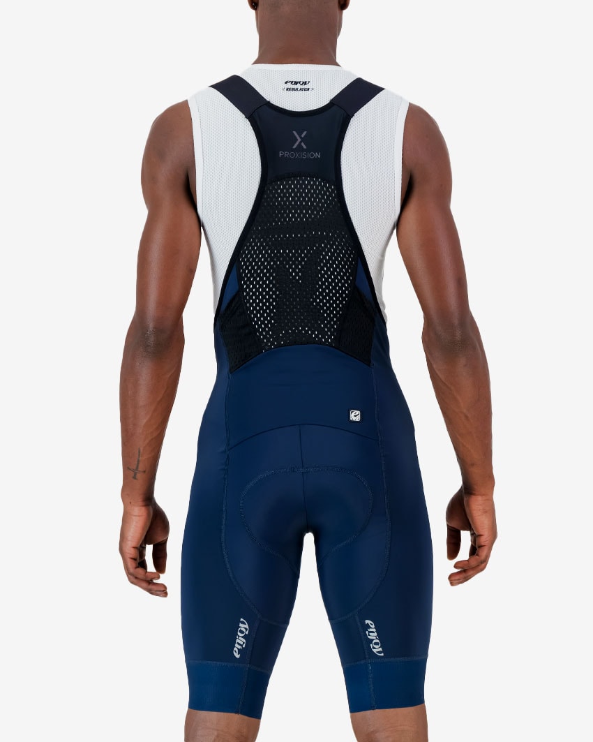 Back view of the Enjoy ProXision mens cargo bib short in the petrol colourway made by enjoy.cc