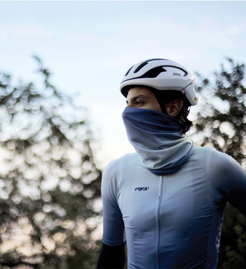 Male cyclist wearing the Enjoy neck warmer from winter 2024 collection design made by enjoy.cc