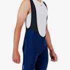 Side view of the Enjoy Dual men's bib short in navy with reflective detailing made by enjoy.cc.