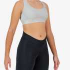 Side view of the Enjoy women's sports bra in the stone colour way available at Enjoy.cc