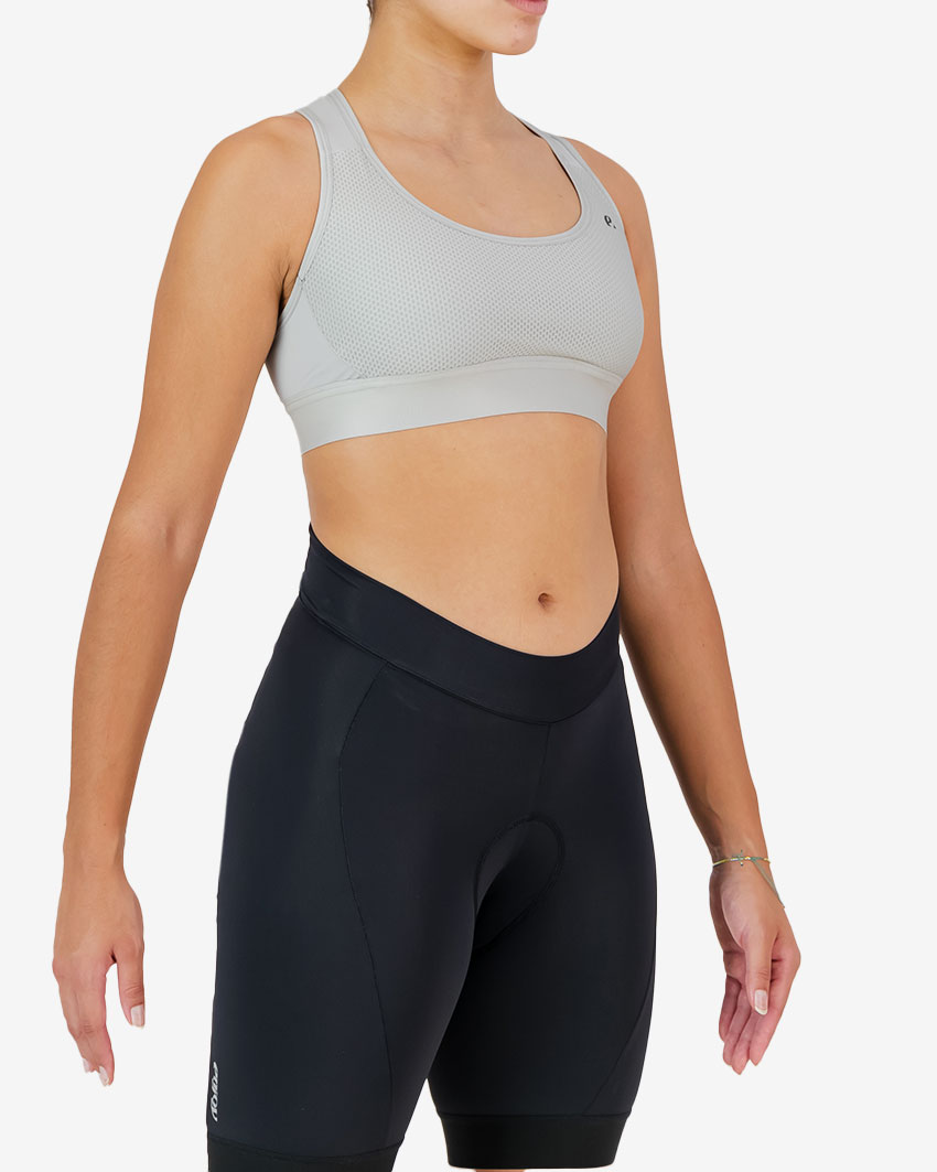 Side view of the Enjoy women's sports bra in the stone colour way available at Enjoy.cc