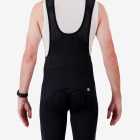 Back view of the Enjoy Dual men's bib short in black with reflective detailing made by enjoy.cc.