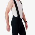 Side view of the Enjoy Octane men's bib short in black with reflective detail made by Enjoy.cc