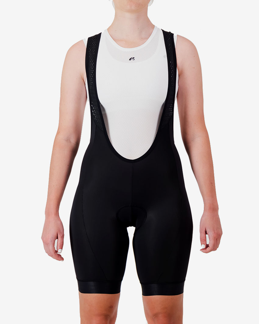 Front view of the Enjoy Dual women's bib short in black with reflective detailing made by enjoy.cc.