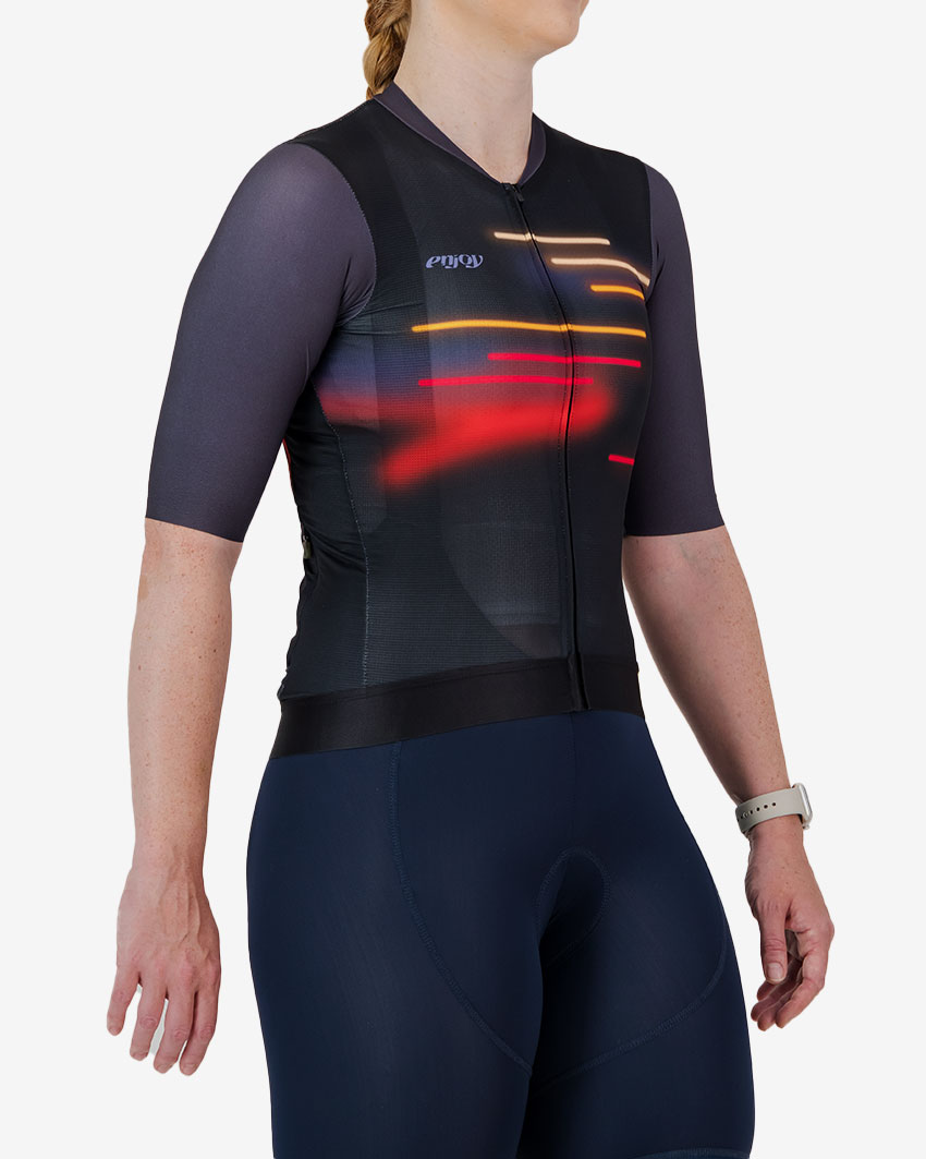 Side view of the ProXision women's cycle jersey in dark Lightspeed design made by enjoy.cc
