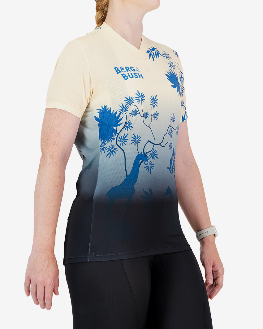 Side view of the Enjoy women's trail tee in the 2025 Berg & Bush design by Enjoy.cc