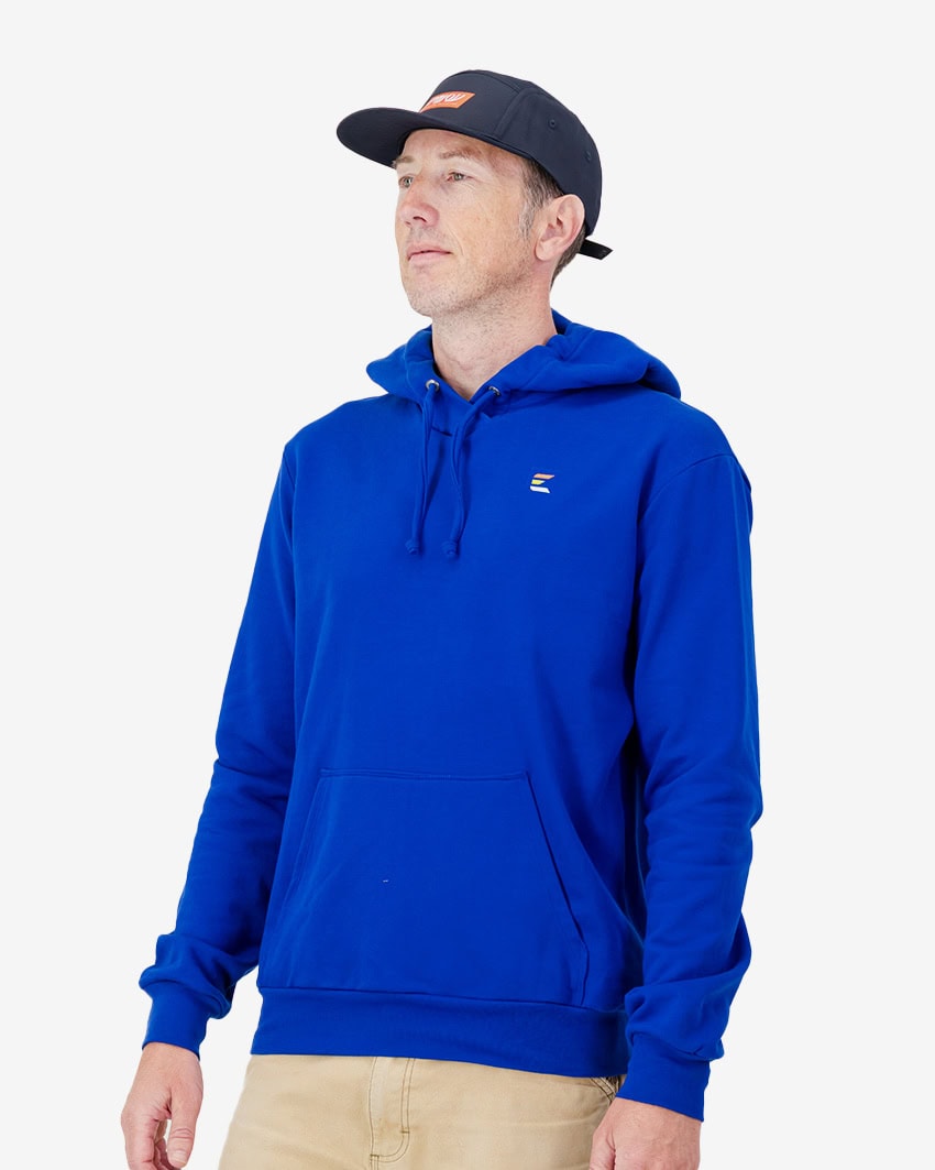 On model view of the unisex U-Flex 5 Panel Ripstop cap in Navy with orange branding by Enjoy.cc