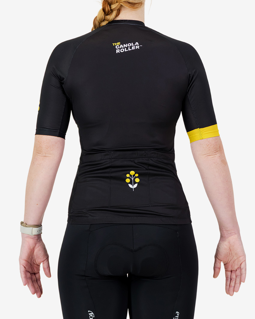 Back view of the women's Supremium cycling jersey in the 2025 Canola Roller design by Enjoy.cc