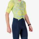 Side view of the men's sleeved triathlon suit in a bright lichen design made by enjoy.cc