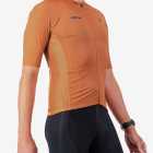 Side view of the Mens Supremium cycling jersey in a solid Clay colour way by Enjoy.cc