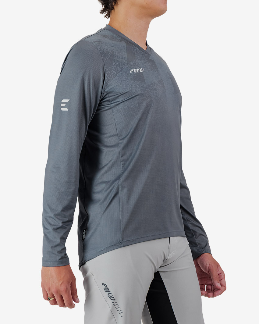 Side view of the Enjoy men's Enduro Long Sleeve Trail Tee in Dark Grey made by Enjoy.cc