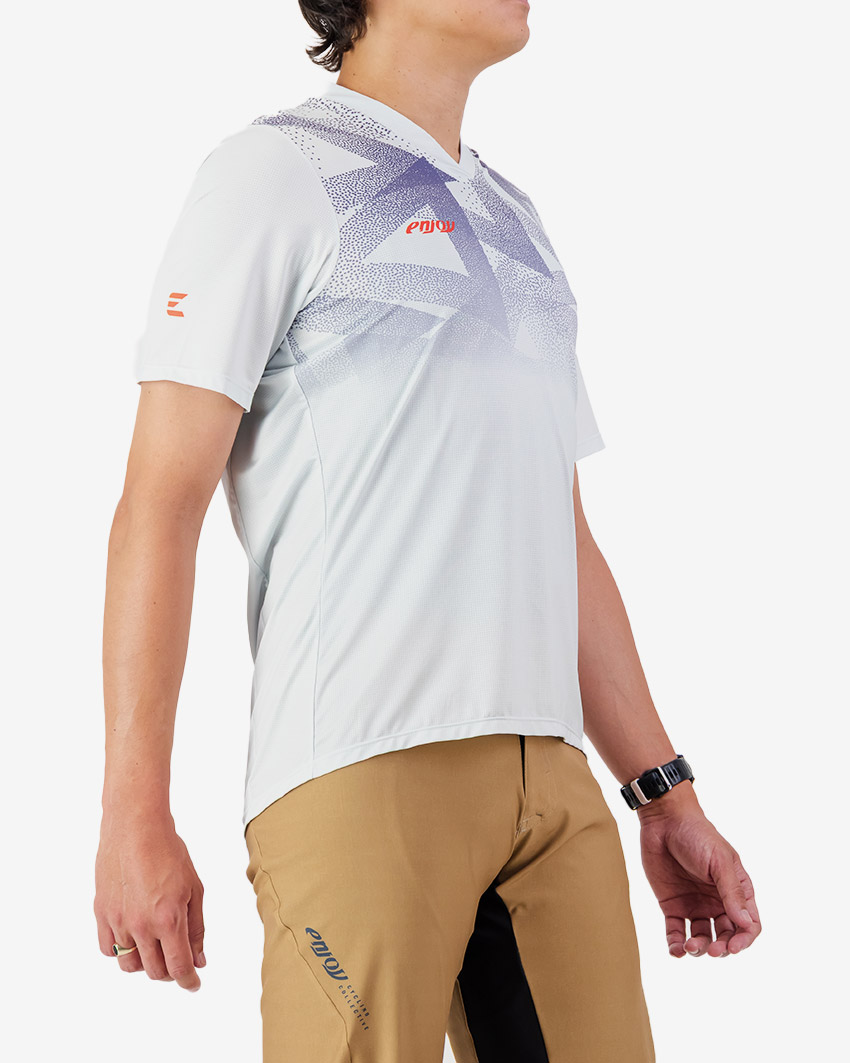 Side view of the Enjoy men's Enduro Trail Tee in Beige with reflective detailing made by Enjoy.cc