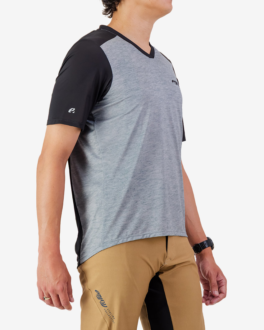 Side view of the Enjoy men's Enduro Trail Tee in black with reflective detailing made by Enjoy.cc