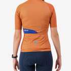 Back view of the Womens Supremium cycling jersey in a solid Clay colour way by Enjoy.cc