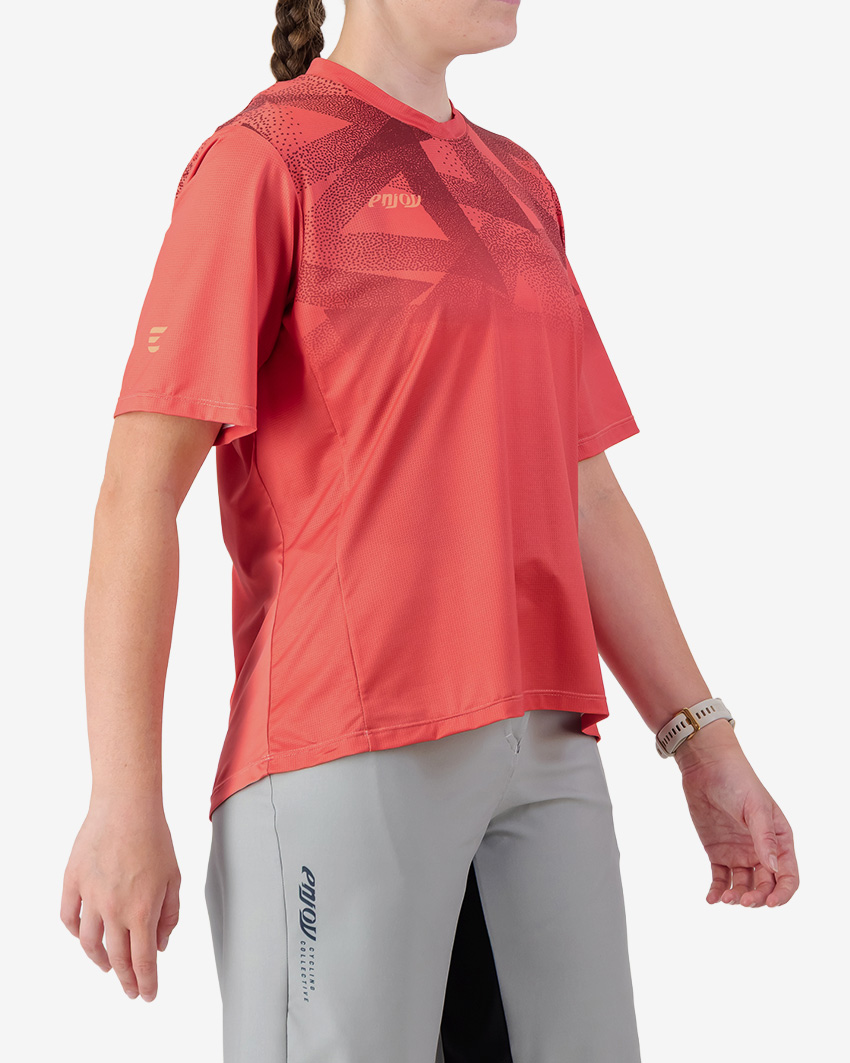 Side view of the Enjoy Women's Enduro Trail Tee in Red with reflective detailing made by Enjoy.cc