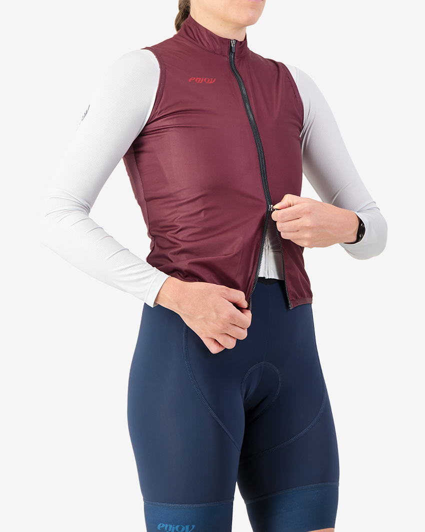 Side view of the scruncher women's cycling gilet with open zip in a mahogany colour by Enjoy.cc