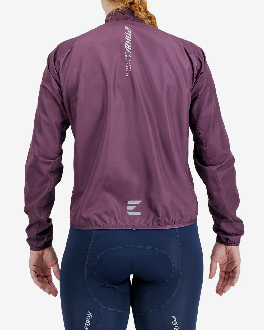 Back view of the Atom women's cycling jacket in a rich Berry colour way by Enjoy.cc