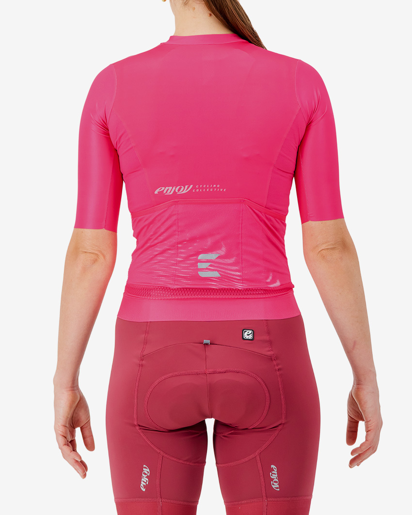 Back view of the Women's ProXision cycling jersey for in pink glitch colour way by enjoy.cc